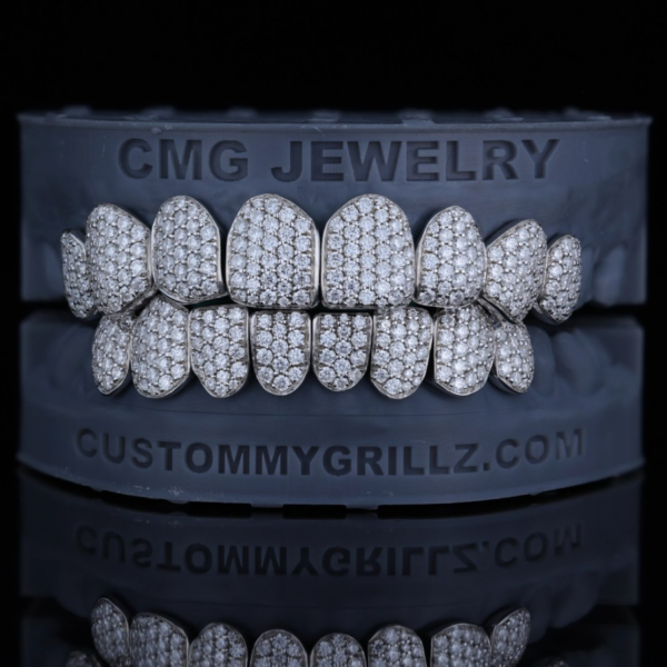 Full-set grillz covered with closely spaced stones in a honeycomb setting.
