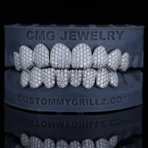 Grillz covered with closely arranged clear stones in a honeycomb-style setting.
