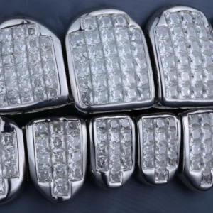 Grillz with closely arranged clear square-cut stones.