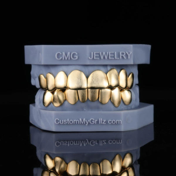 Full-set gold-tone grillz with a satin brushed finish.