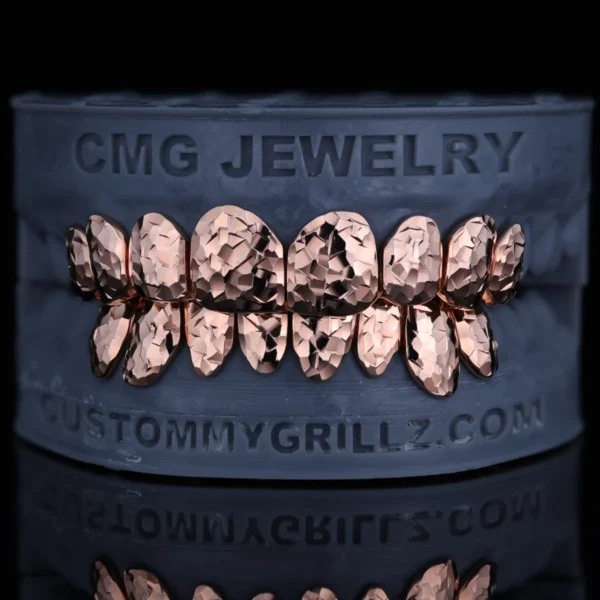 Rose-gold-tone full-set grillz with a crushed-ice textured finish.