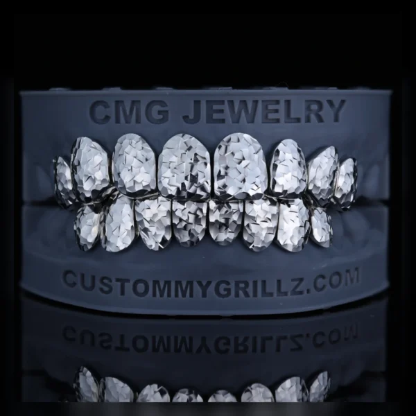 Crushed ice solid platinum grillz shown on a dental model